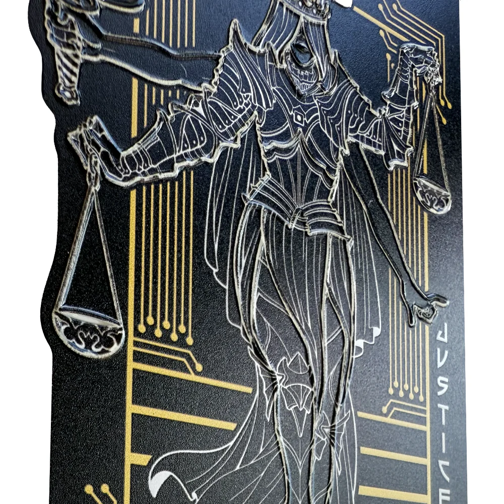 Close up on the raised lines of EFF's Lady Justice Braille Sticker